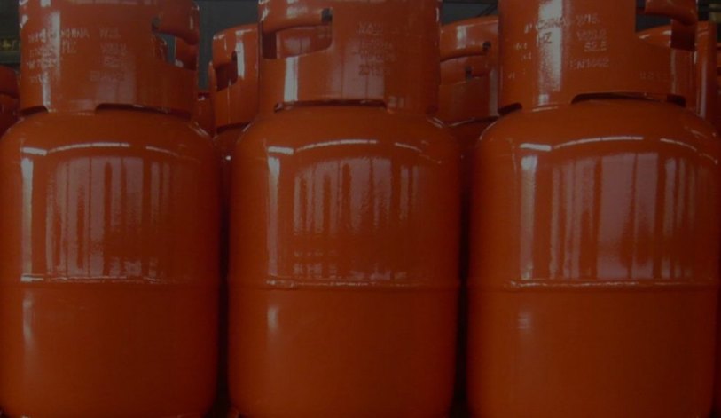 Row of orange LPG cylinders